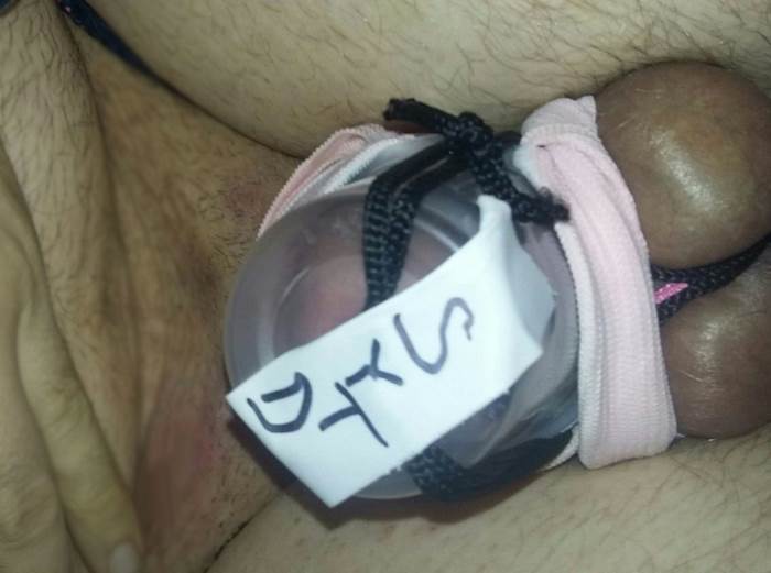 Dinky dick locked into his homemade chastity device.